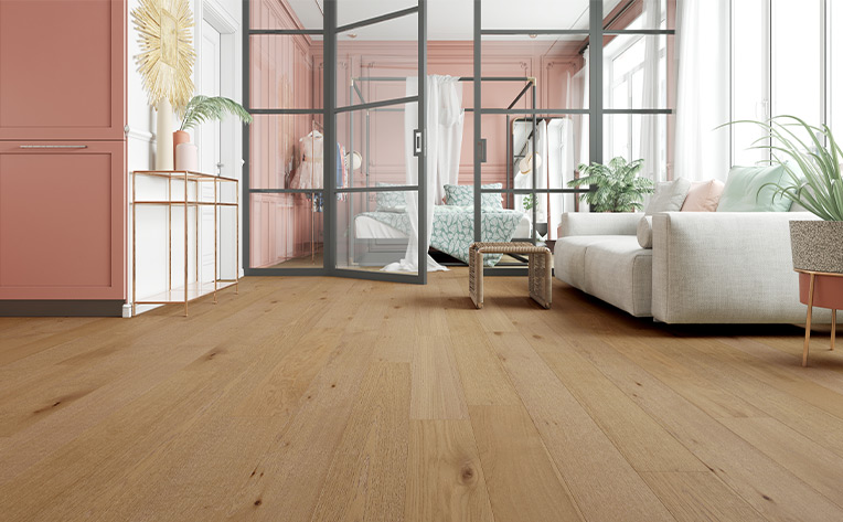 warm toned wide plank hardwood flooring in apartment